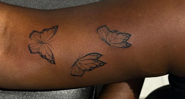 équipe de tatoueurs